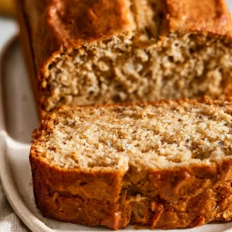 Delicious sour cream banana bread slice on a wooden table